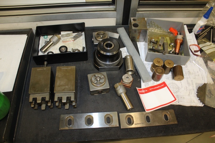 Cabinet with Tooling, Clamping and Shapes for Wire Eroders