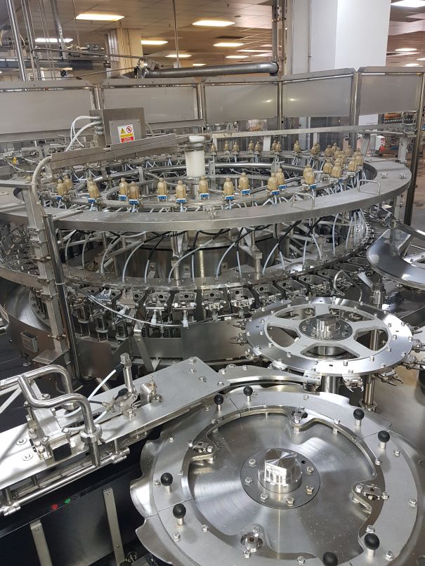 GEA Procomac Fillstar 80-Head Volumetric Filler and Rinser