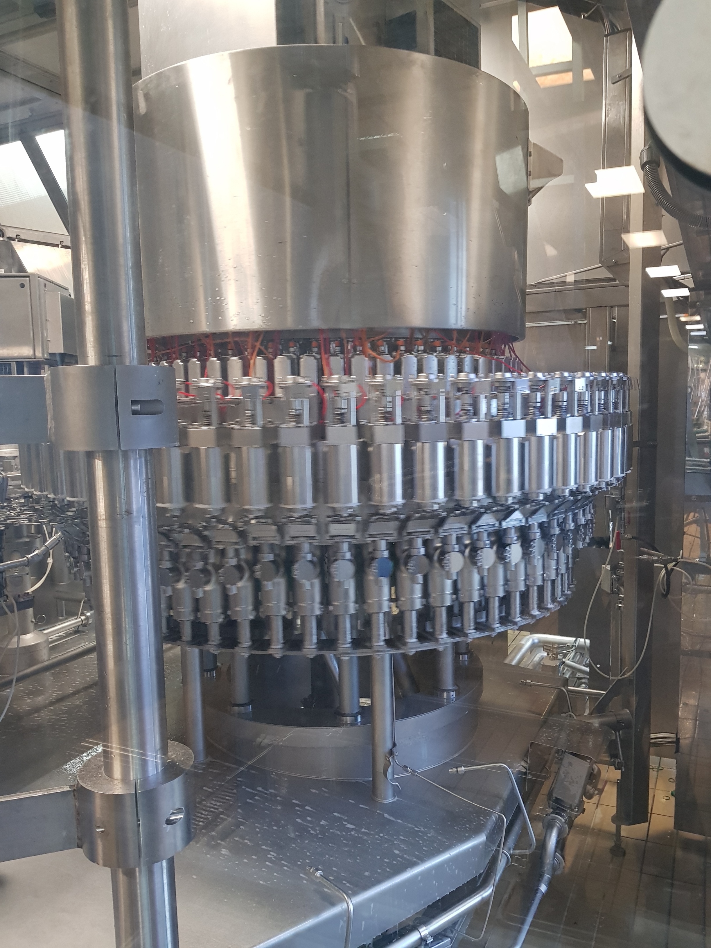 KRONES Volumetric Filler / Capper