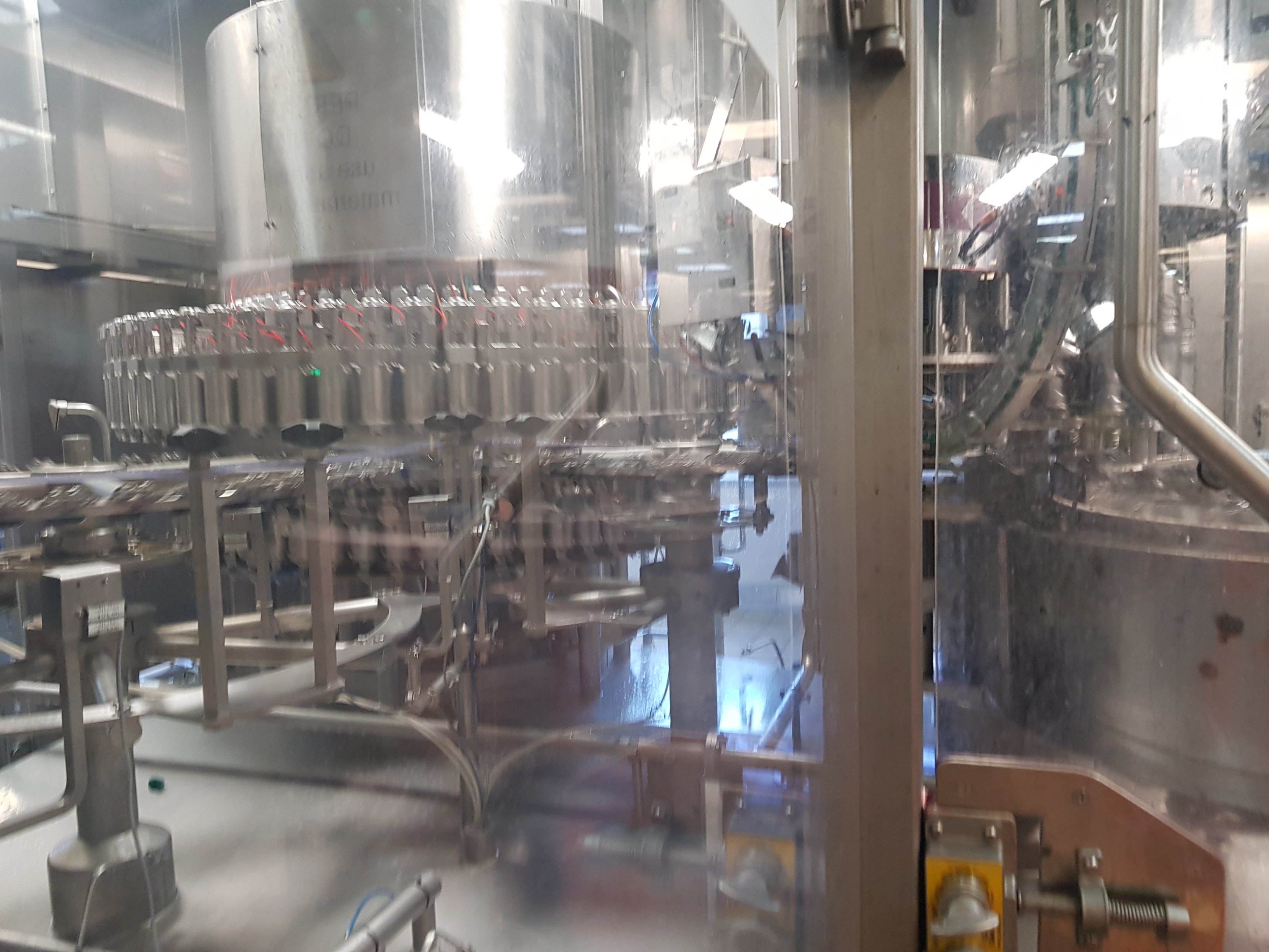 KRONES Volumetric Filler / Capper