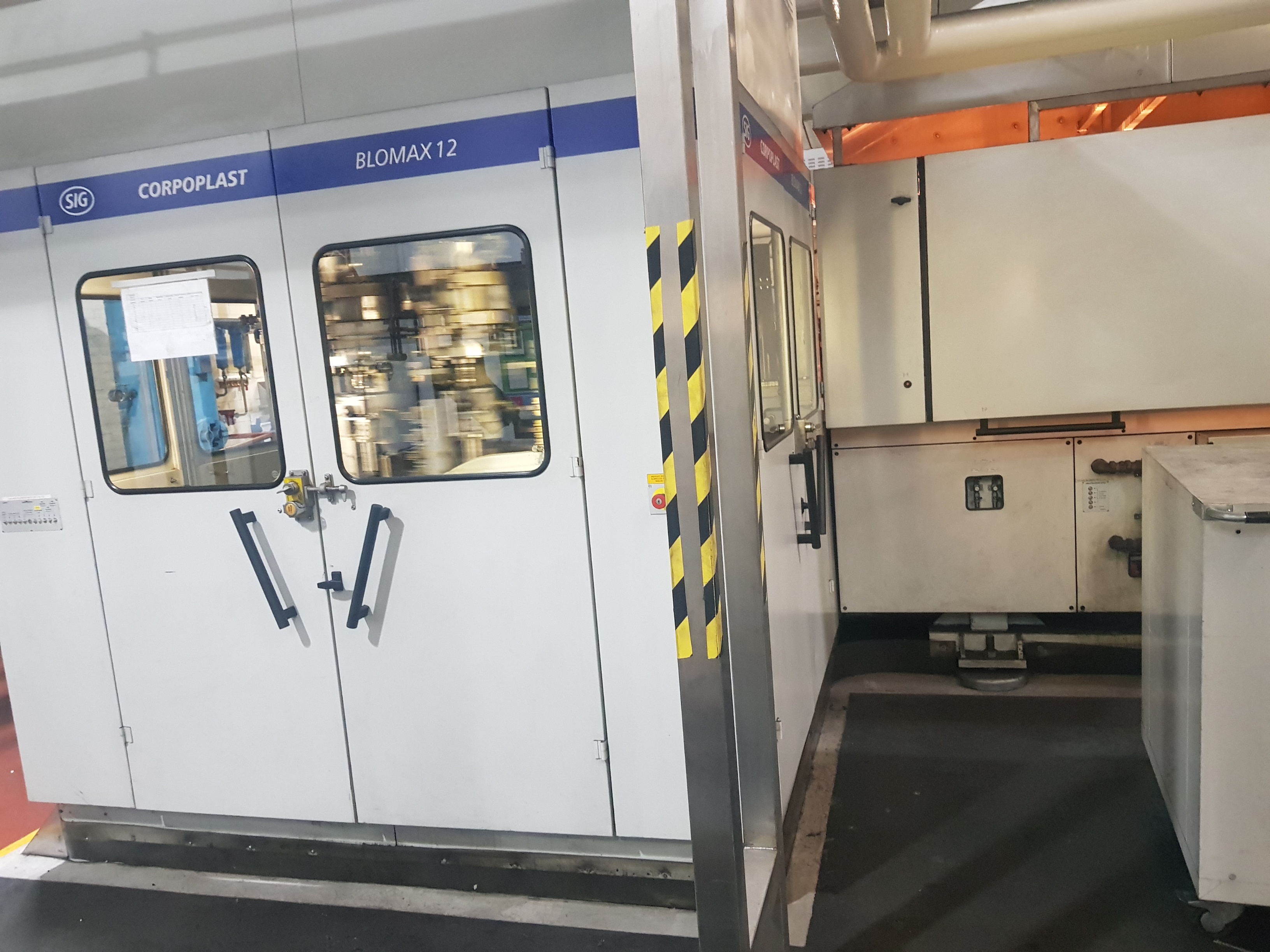 SIG Blowmax-12 12- Station Stretch Blow Moulder