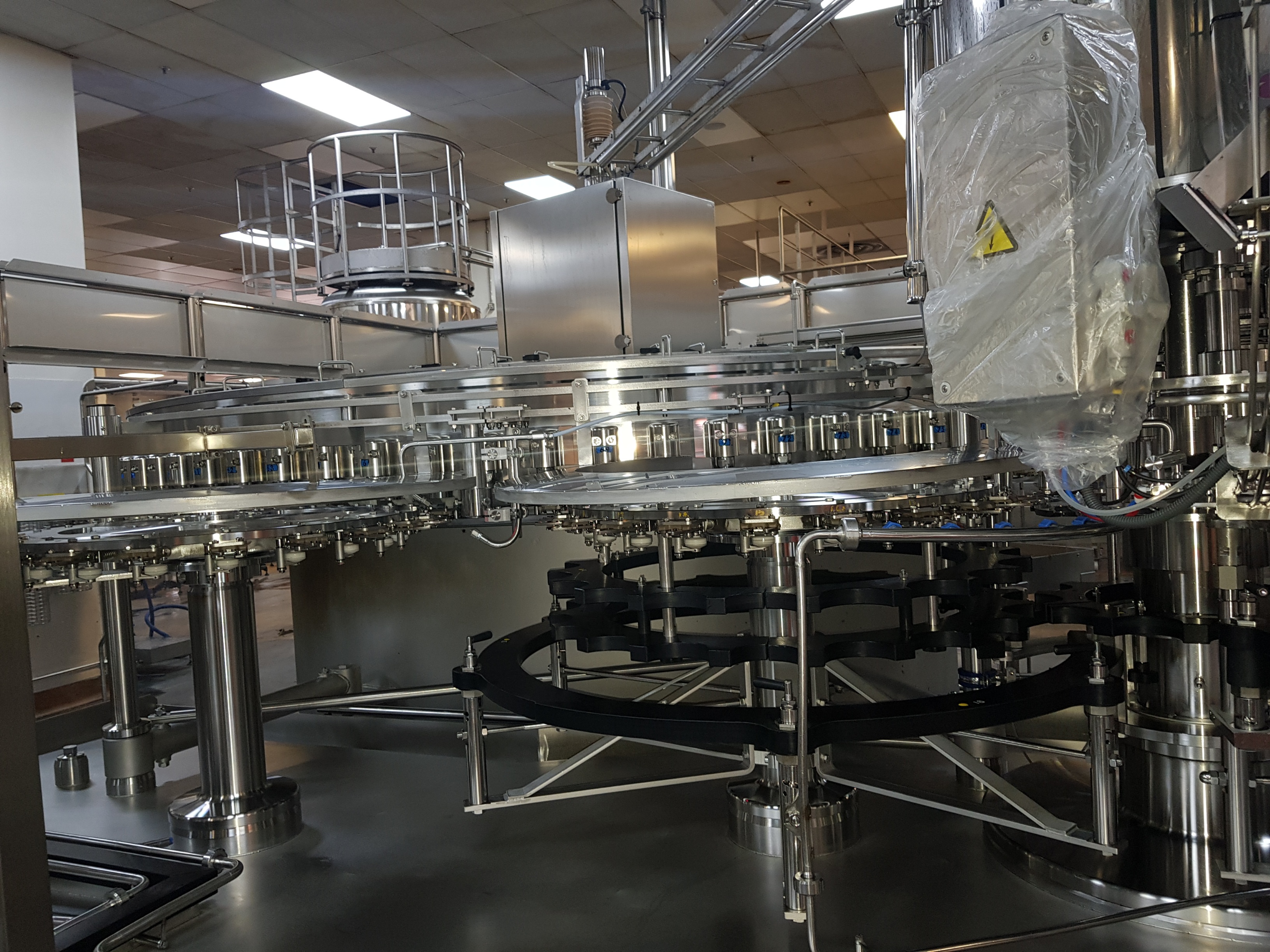 GEA Procomac Fillstar 80-Head Volumetric Filler and Rinser