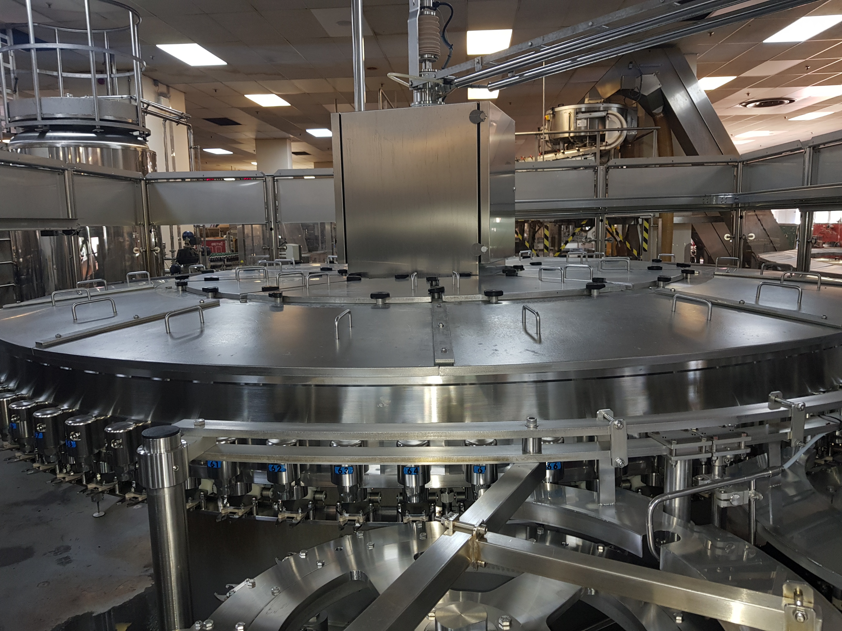 GEA Procomac Fillstar 80-Head Volumetric Filler and Rinser