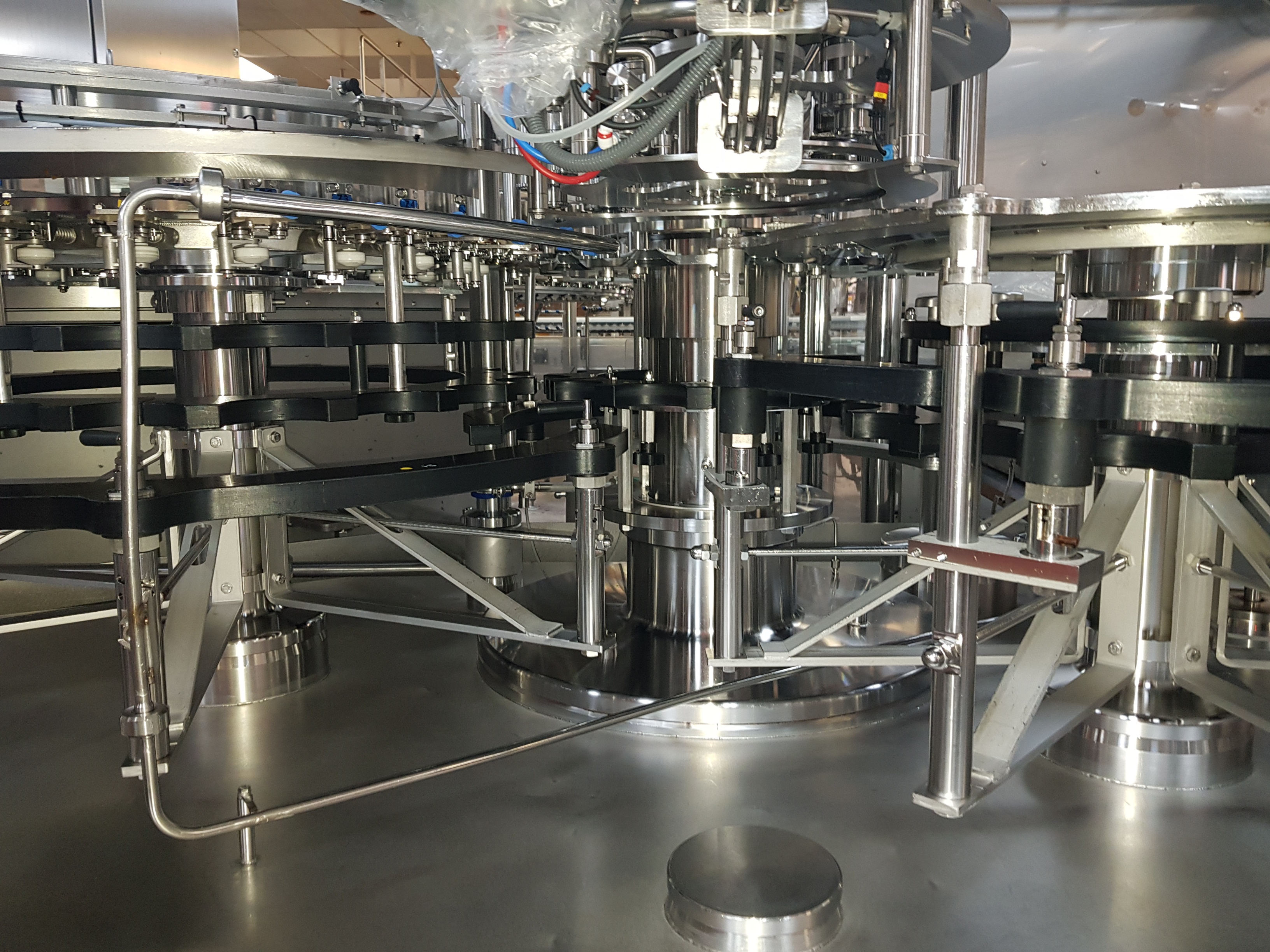 GEA Procomac Fillstar 80-Head Volumetric Filler and Rinser