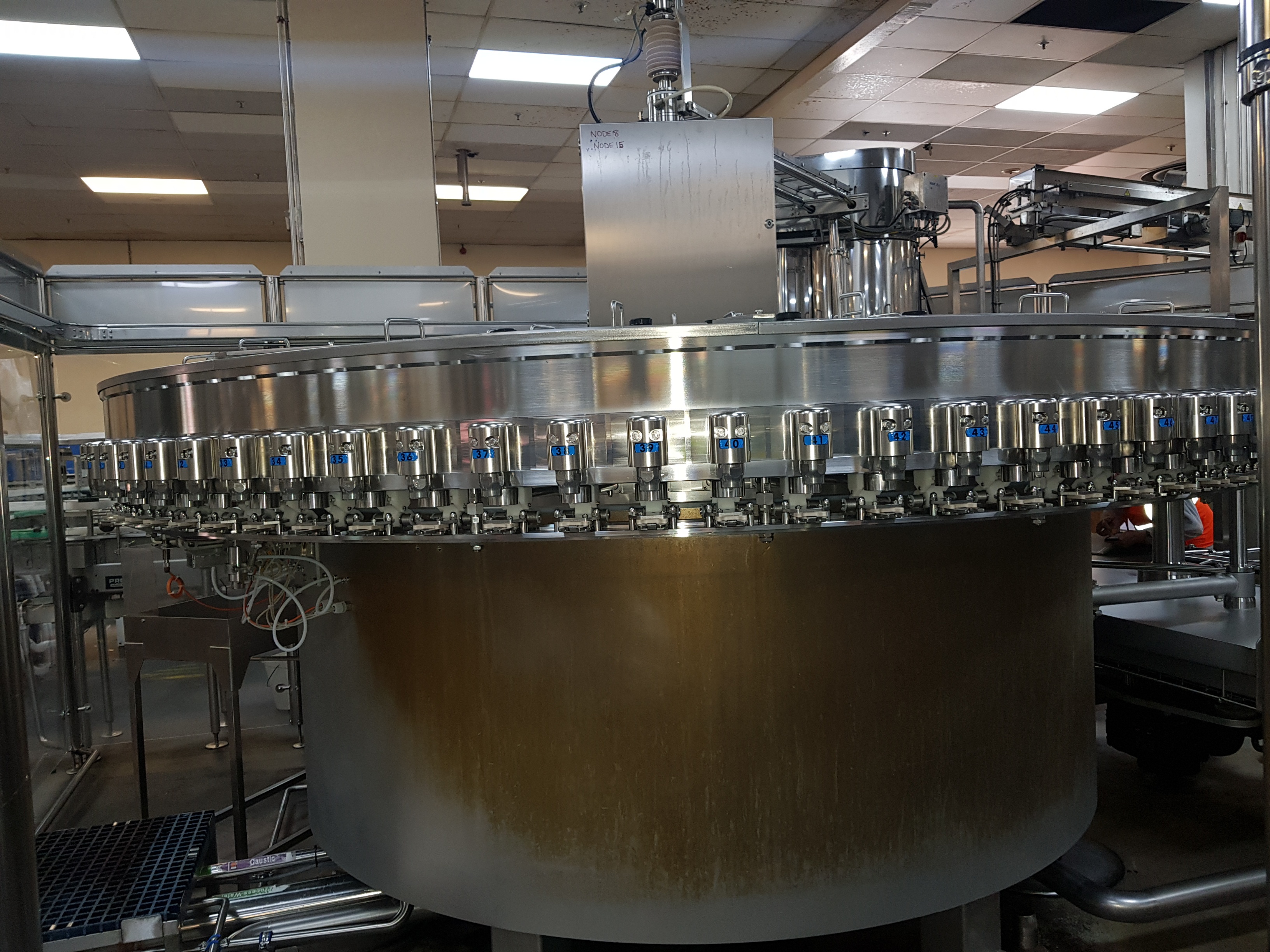 GEA Procomac Fillstar 80-Head Volumetric Filler and Rinser