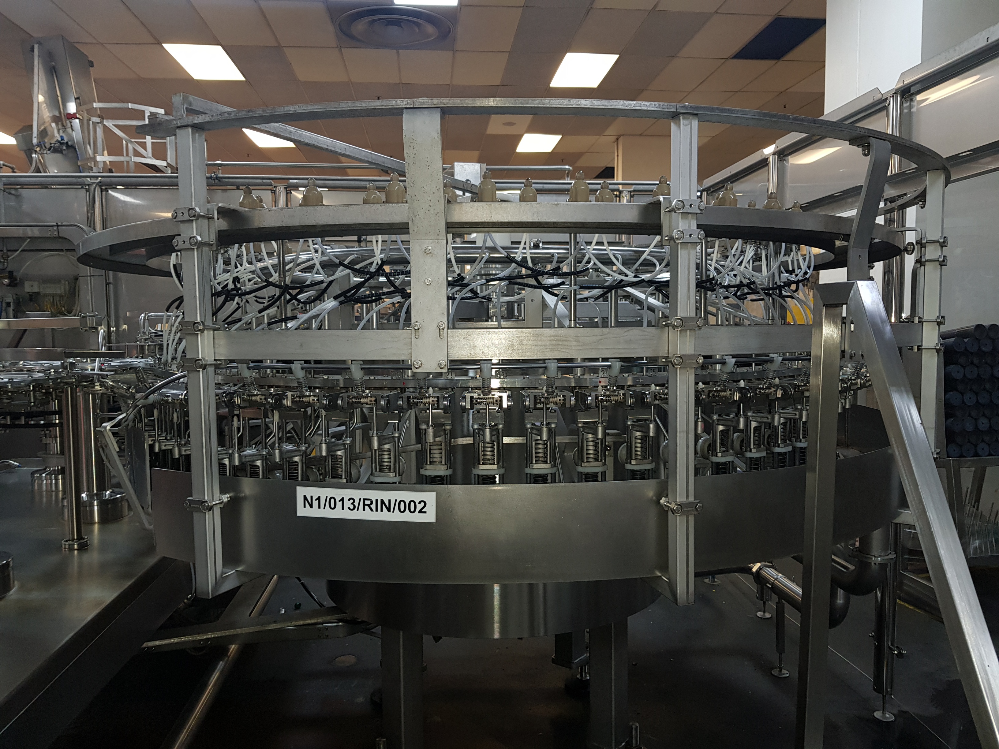 GEA Procomac Fillstar 80-Head Volumetric Filler and Rinser