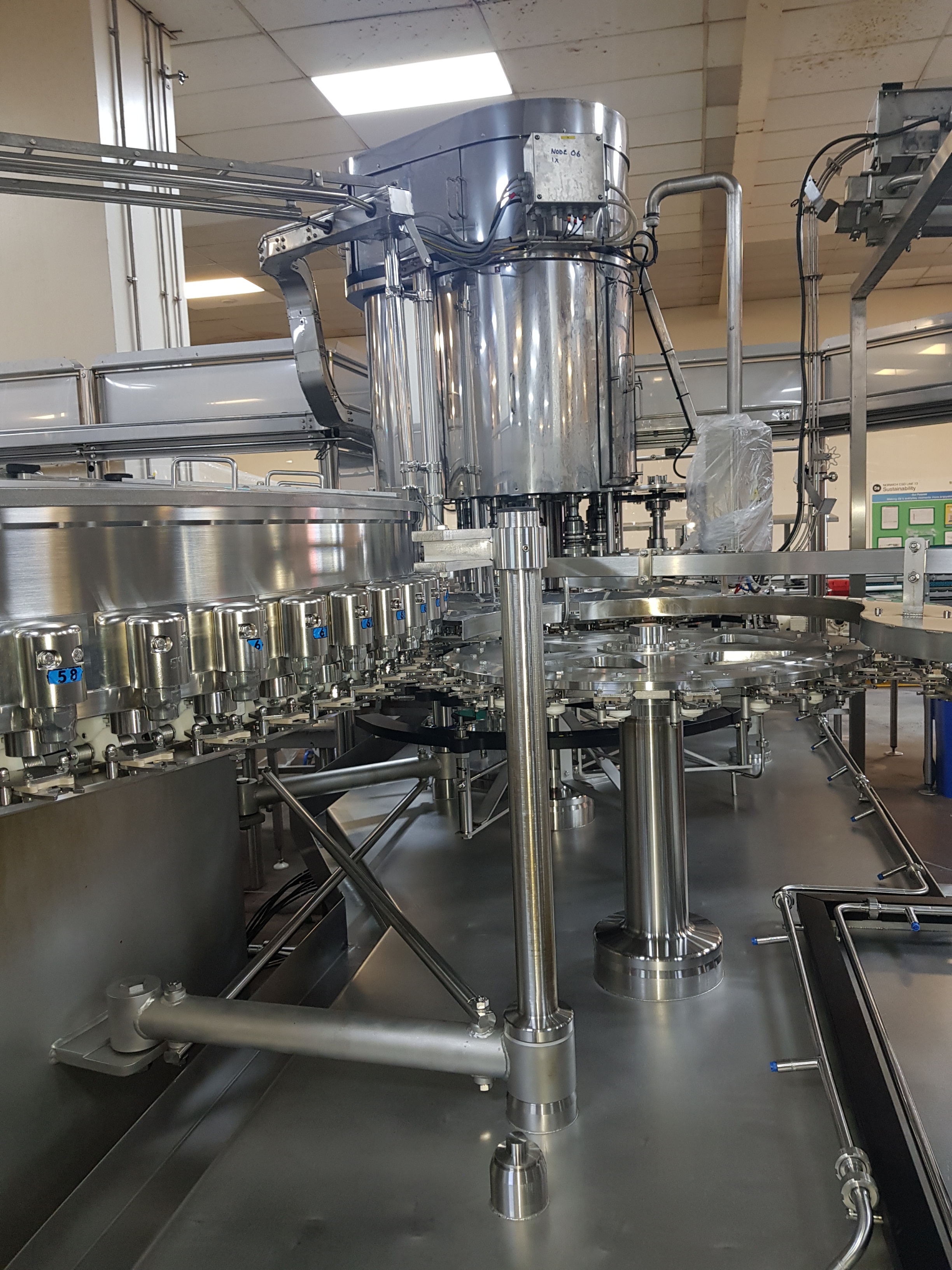 GEA Procomac Fillstar 80-Head Volumetric Filler and Rinser