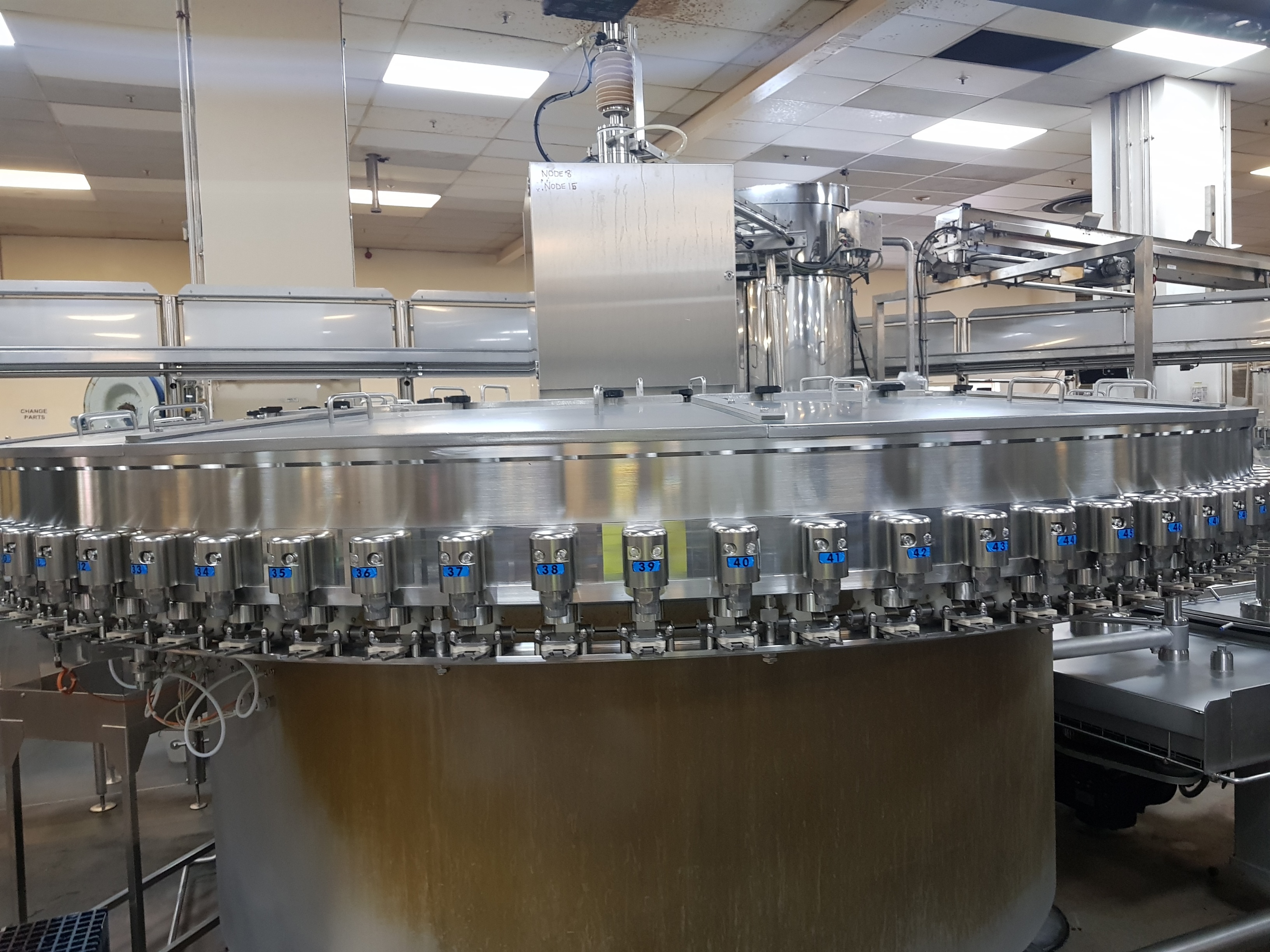 GEA Procomac Fillstar 80-Head Volumetric Filler and Rinser