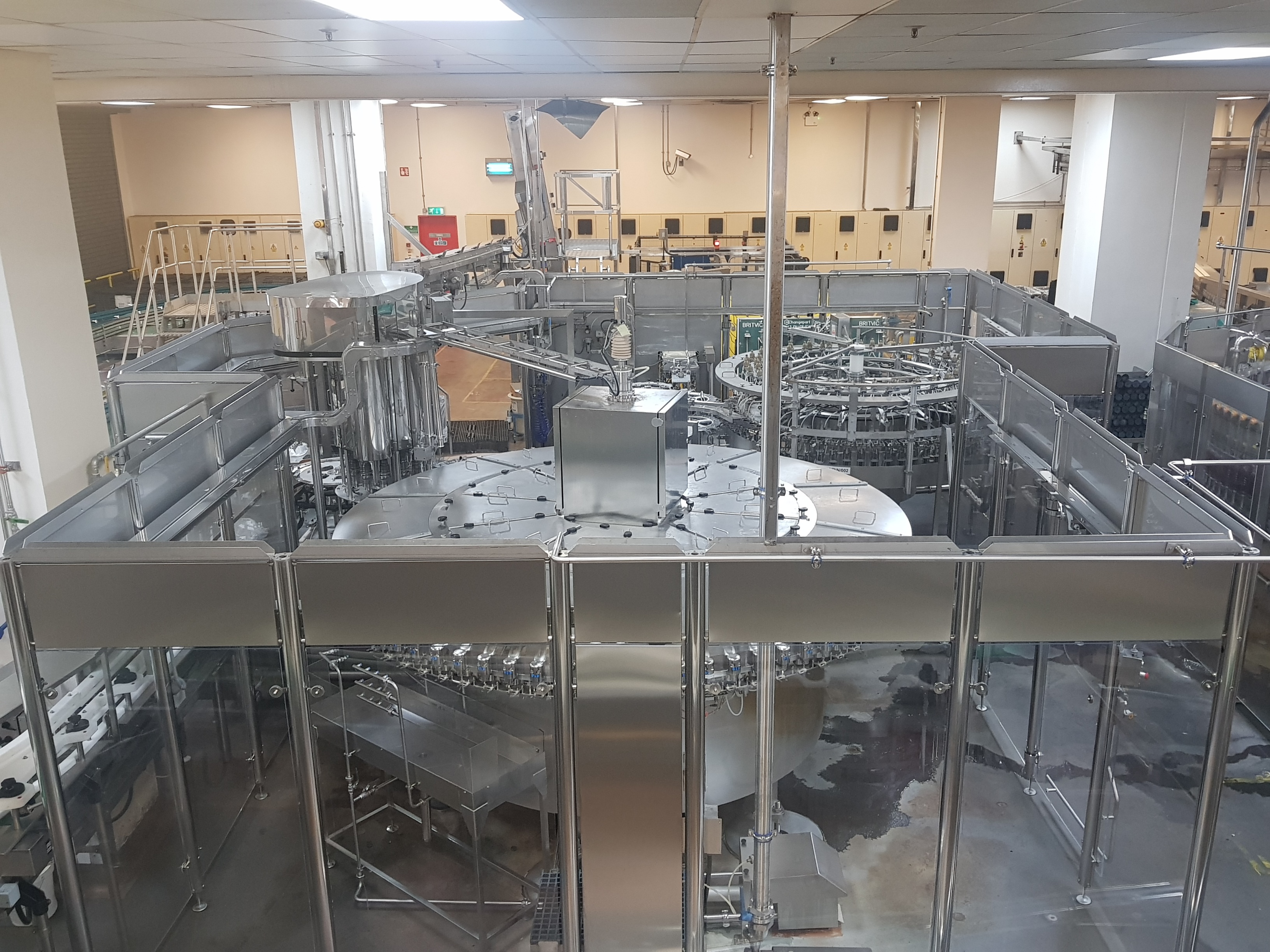 GEA Procomac Fillstar 80-Head Volumetric Filler and Rinser