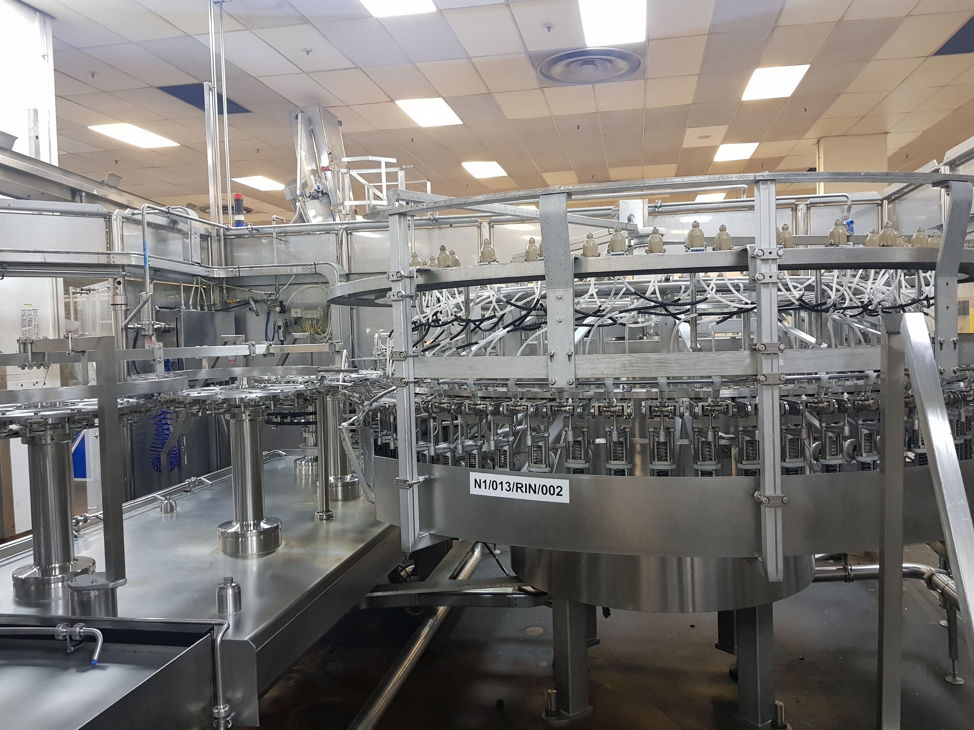 GEA Procomac Fillstar 80-Head Volumetric Filler and Rinser