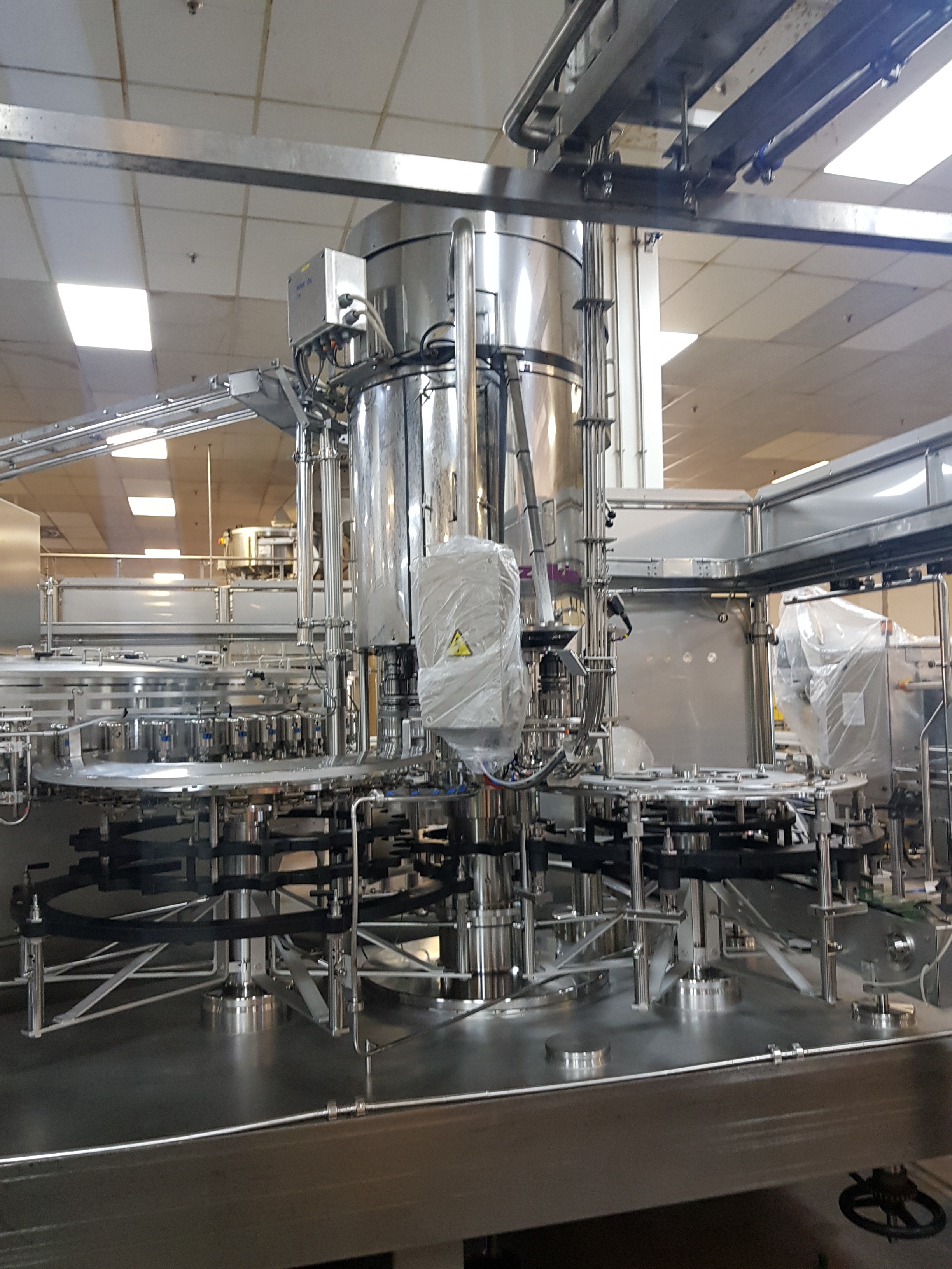 GEA Procomac Fillstar 80-Head Volumetric Filler and Rinser