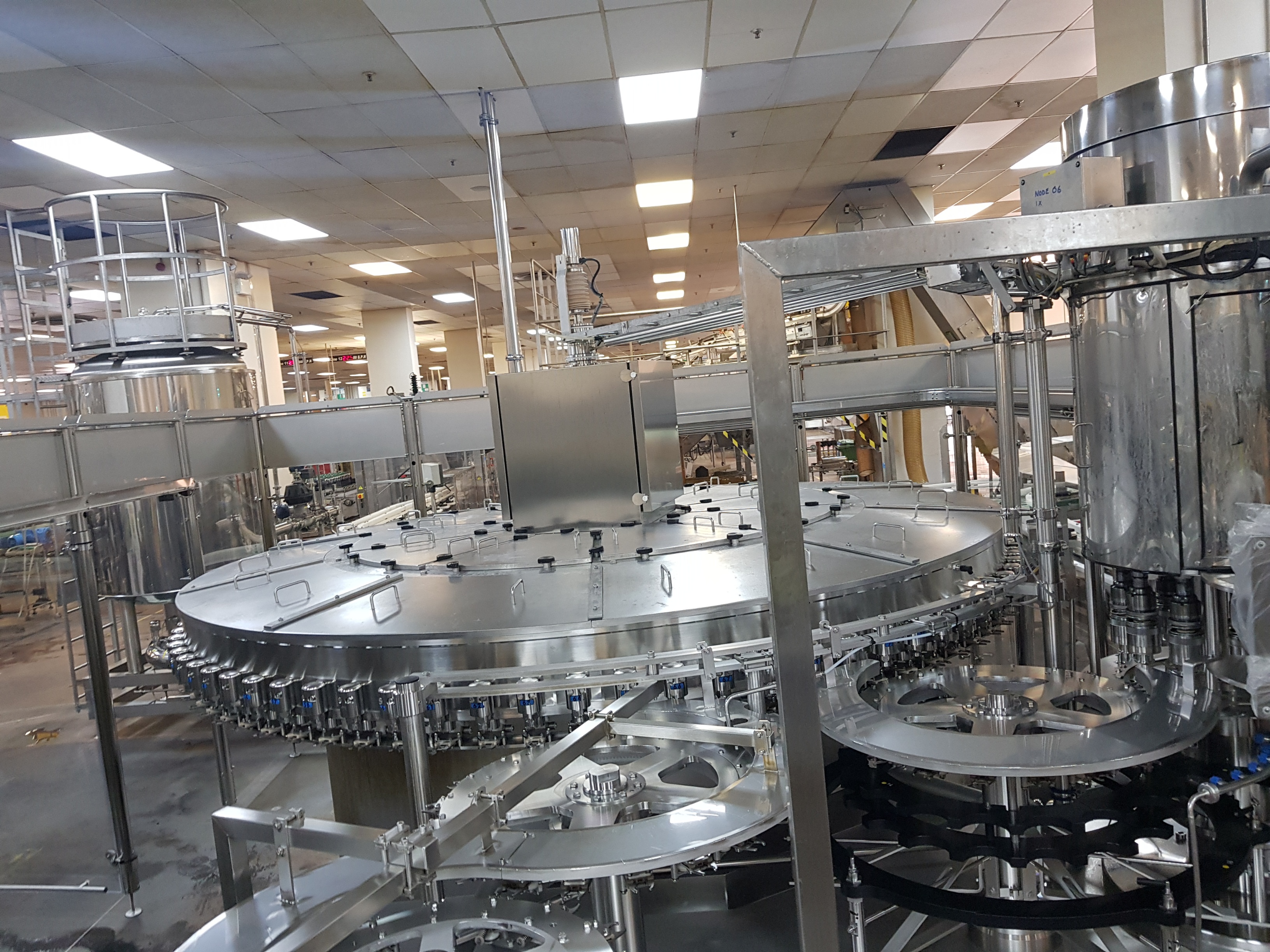 GEA Procomac Fillstar 80-Head Volumetric Filler and Rinser