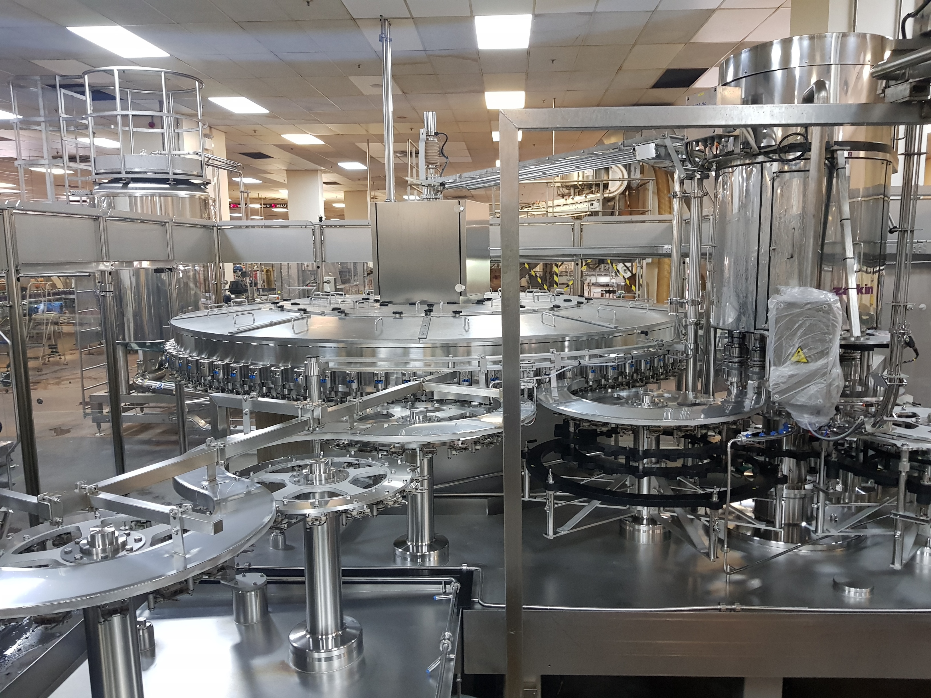 GEA Procomac Fillstar 80-Head Volumetric Filler and Rinser