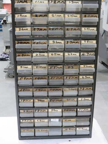 Storage Rack with Qty High Speed Drills