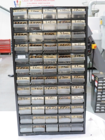 Storage Rack with Qty High Speed Drills
