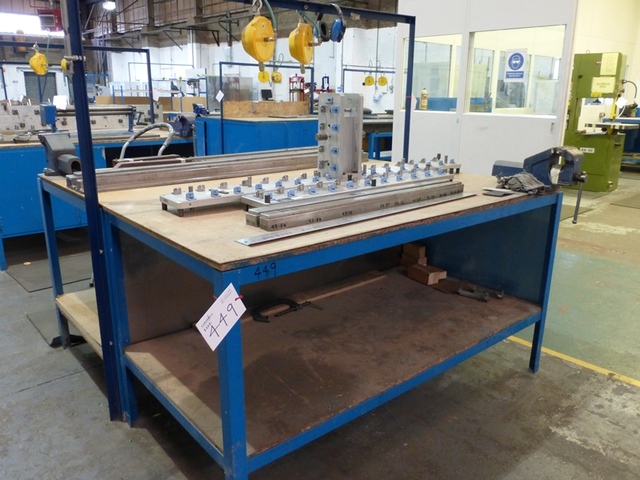 (4) Steel Framed Benches, (3) Vices, and (4) Universal Air Tool Balancers