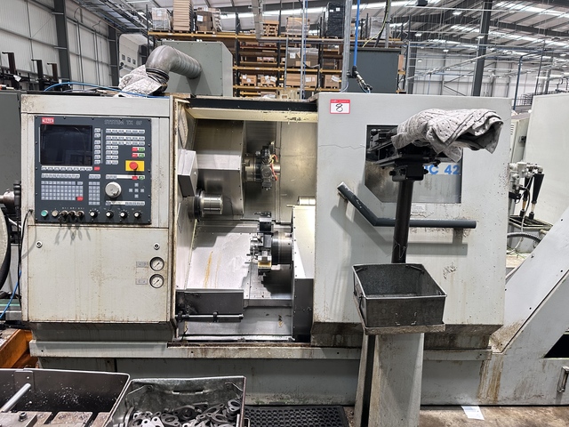 Traub Type TNC 42/65 DG CNC Lathe with Traub System TX8F Control (1995)