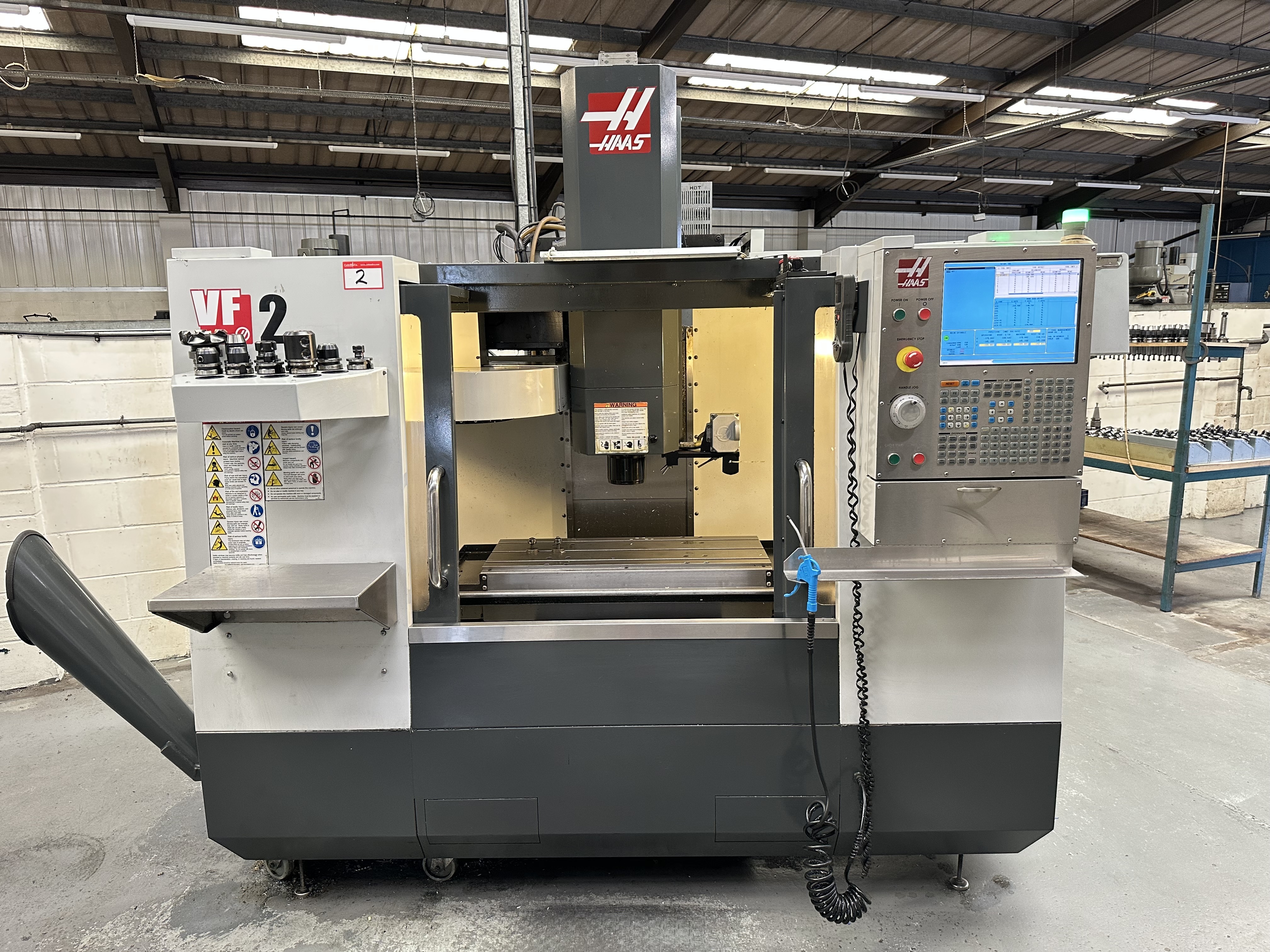 Haas VF-2CDE CNC Vertical Machining Centre with Haas CNC Control. (11/2009)