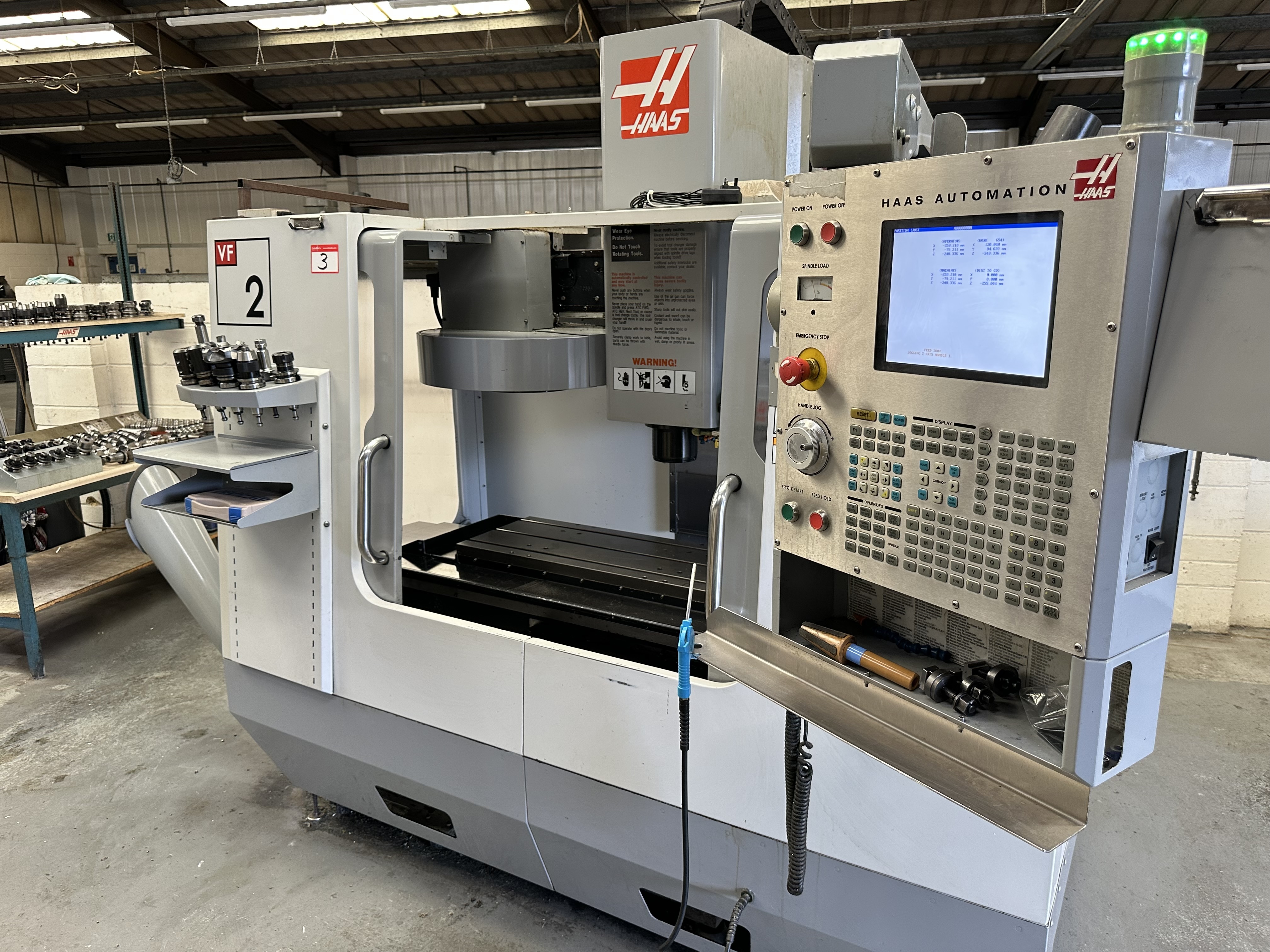 Haas VF2DE Vertical Machining Centre with Haas CNC Control. (02/2006)