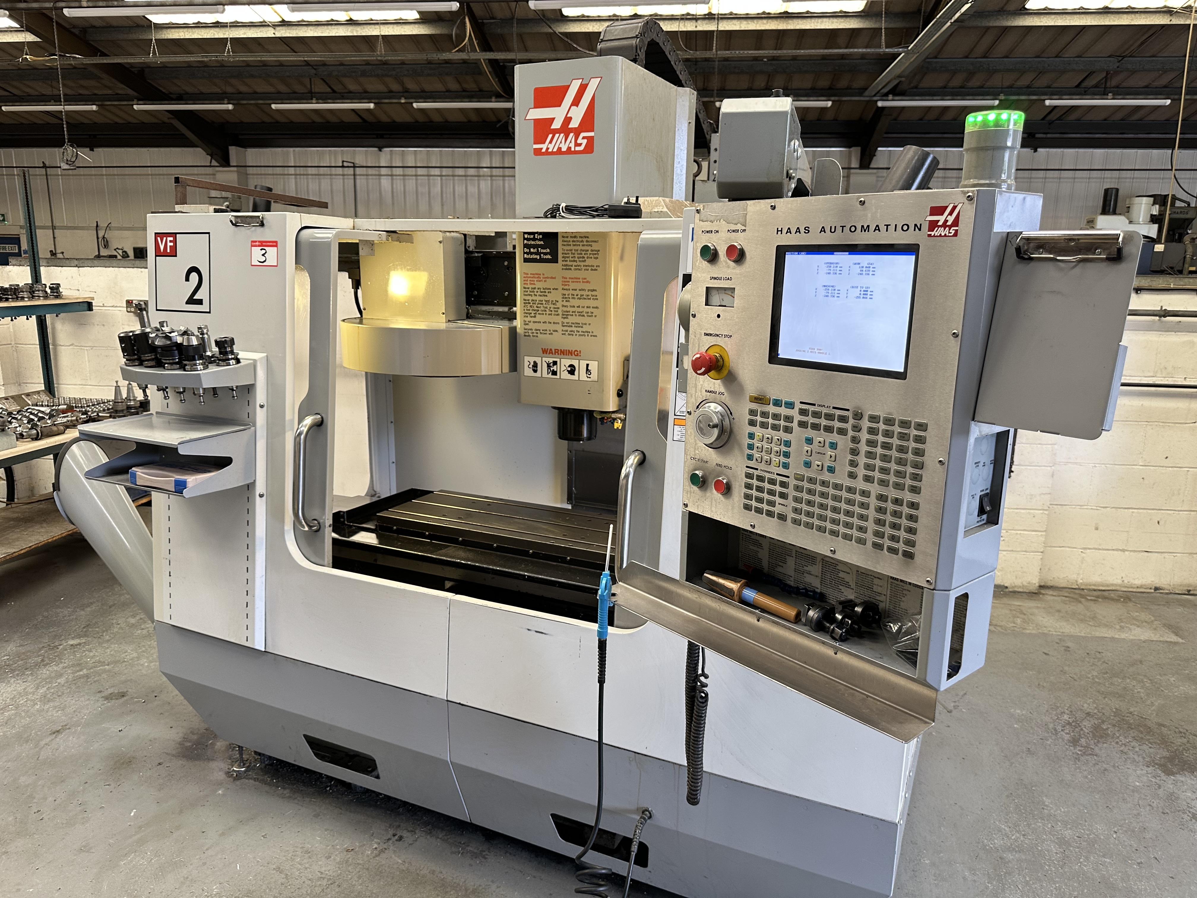 Haas VF2DE Vertical Machining Centre with Haas CNC Control. (02/2006)