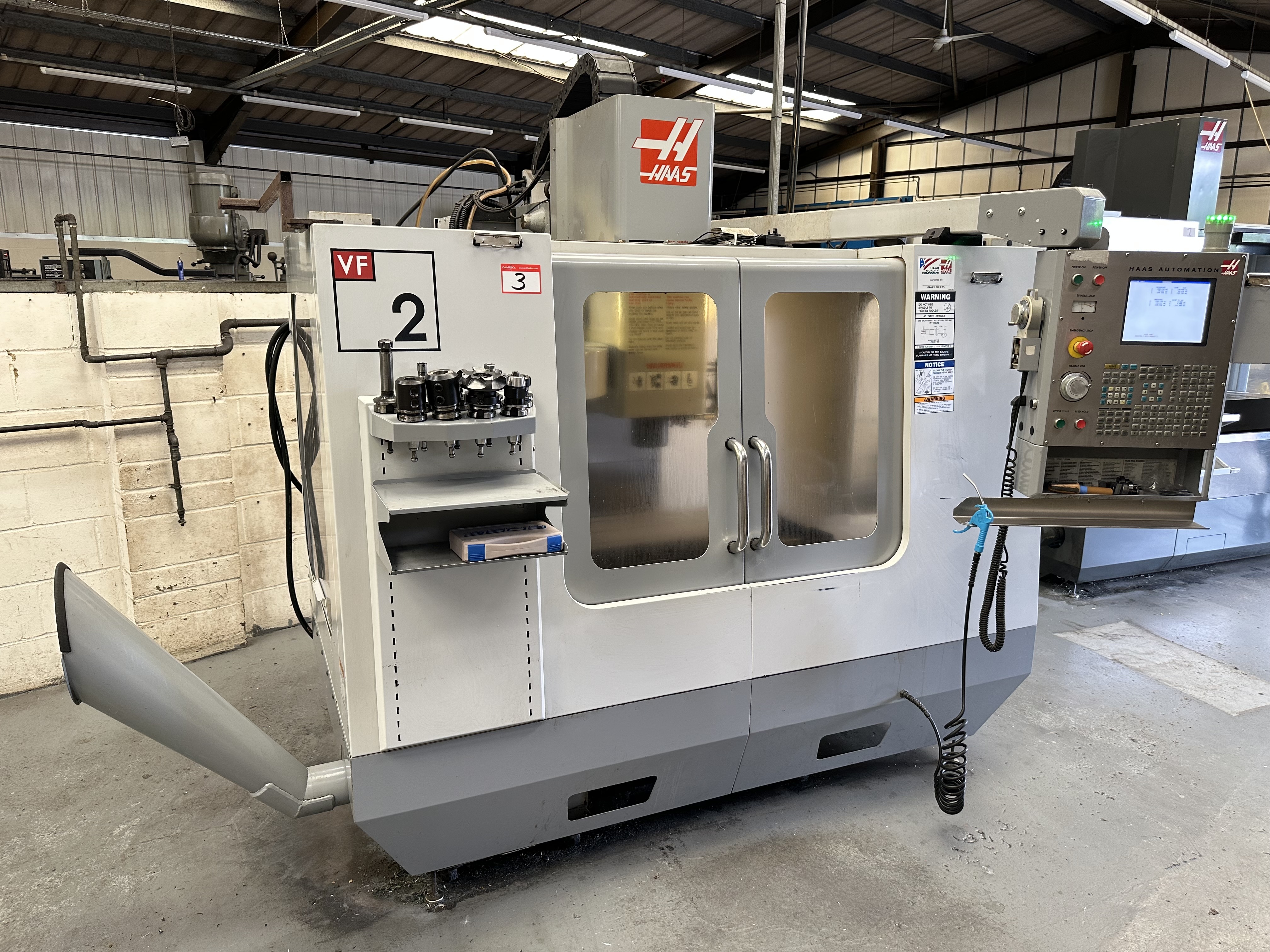 Haas VF2DE Vertical Machining Centre with Haas CNC Control. (02/2006)