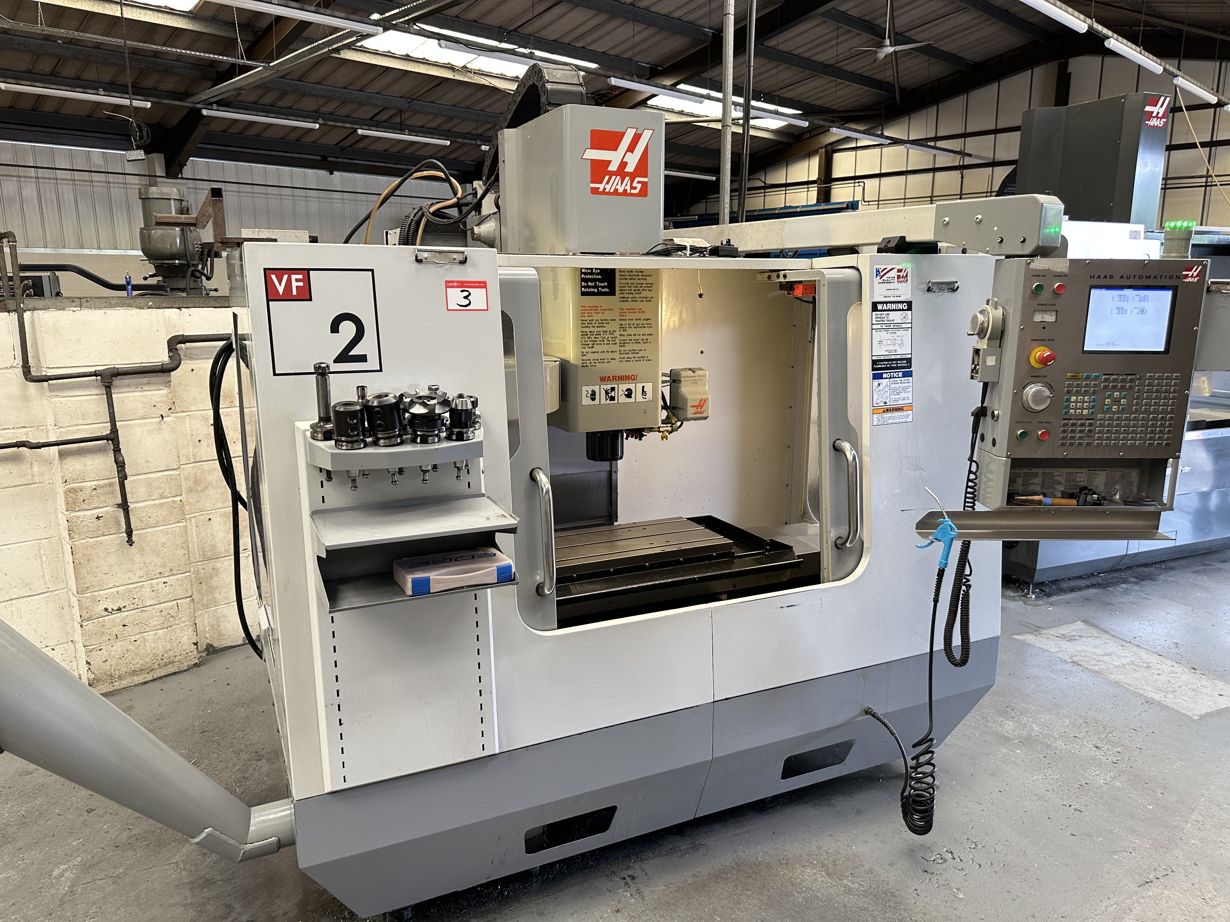Haas VF2DE Vertical Machining Centre with Haas CNC Control. (02/2006)