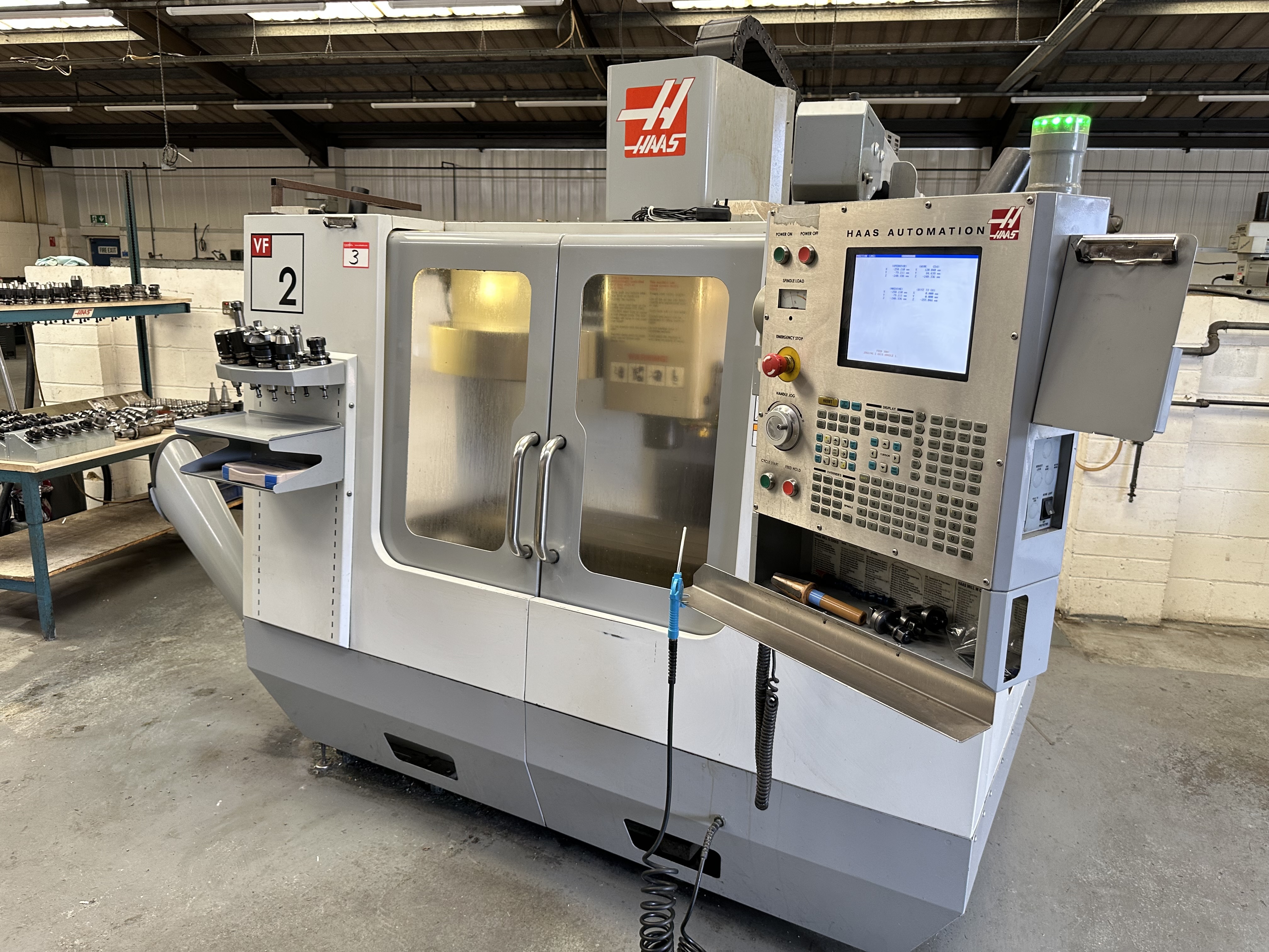 Haas VF2DE Vertical Machining Centre with Haas CNC Control. (02/2006)