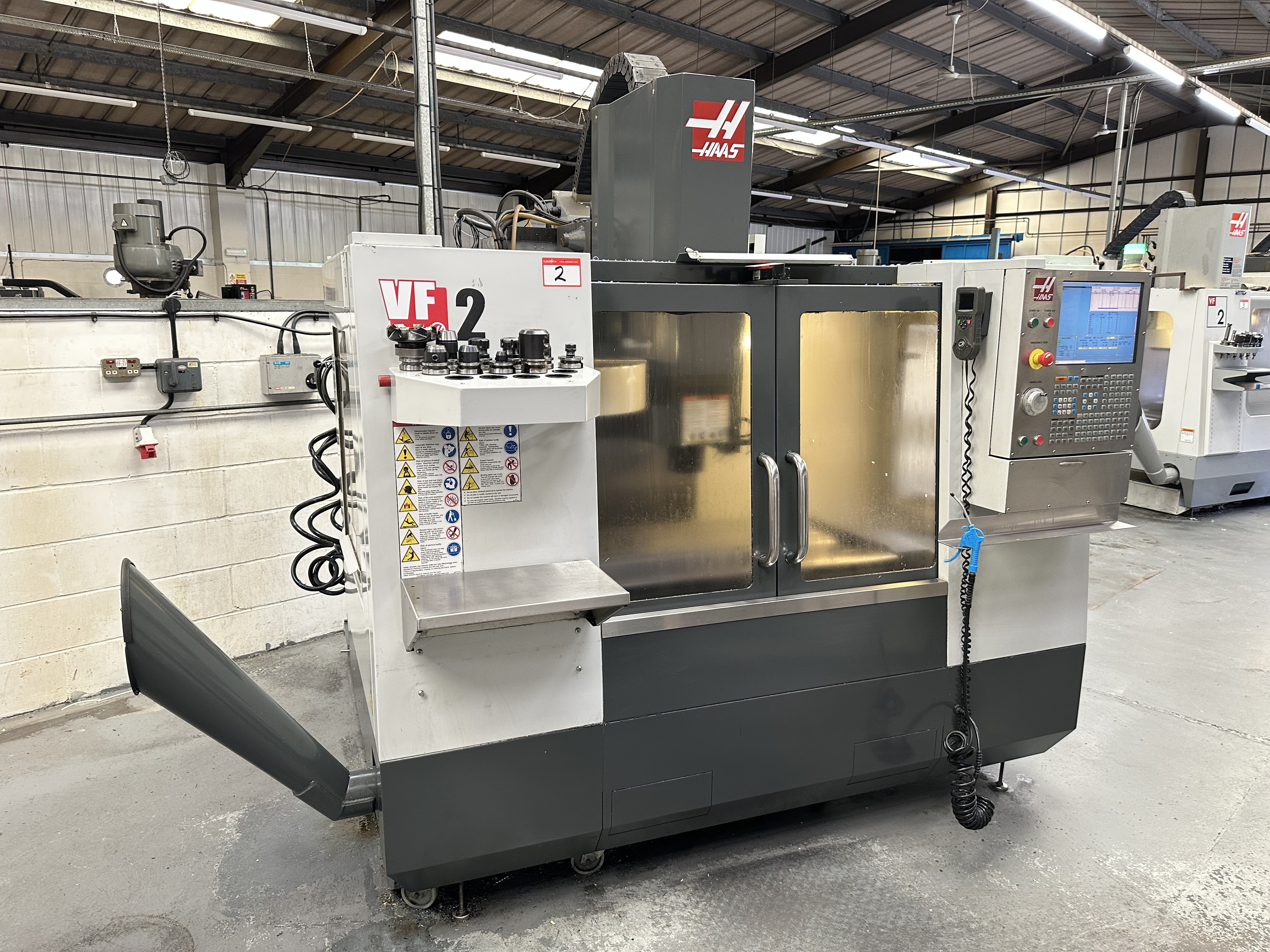 Haas VF-2CDE CNC Vertical Machining Centre with Haas CNC Control. (11/2009)