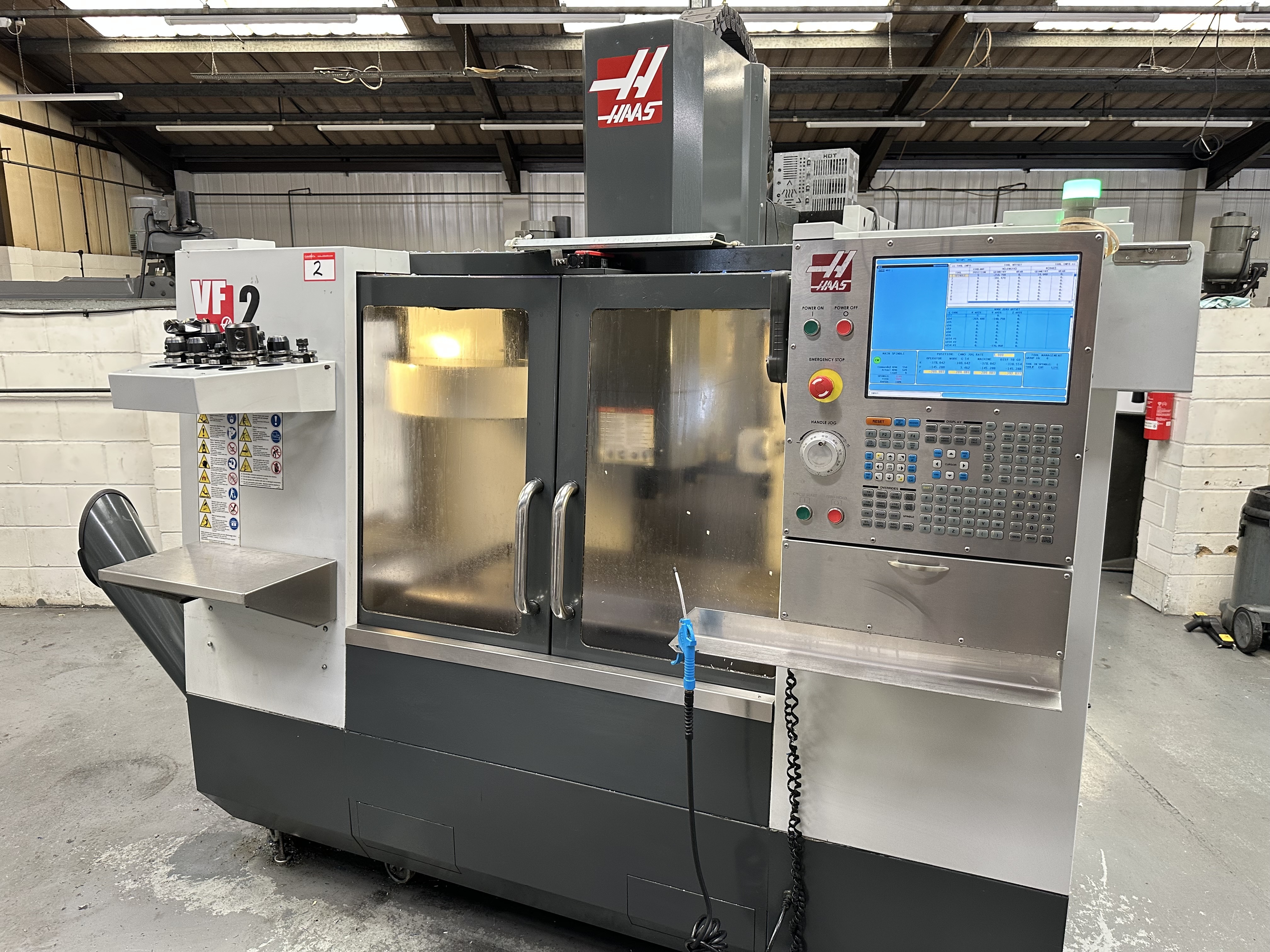 Haas VF-2CDE CNC Vertical Machining Centre with Haas CNC Control. (11/2009)