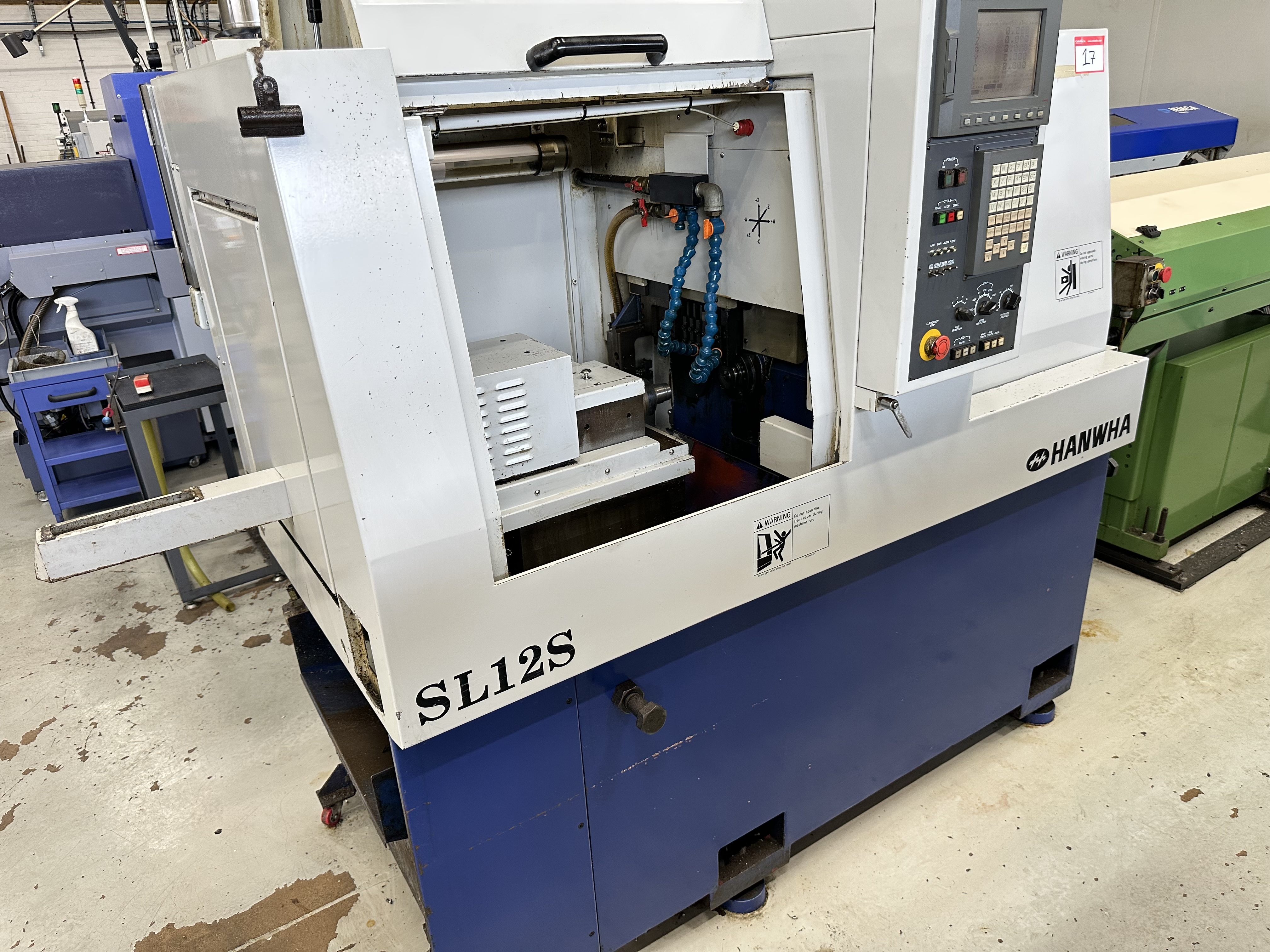 Hanwha SL12S Sliding Head Lathe 5 Axis Machine with Fanuc Series 18i-T CNC Control (2003)