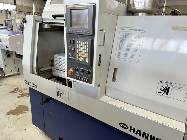 Hanwha SL12S Sliding Head Lathe 5 Axis Machine with Fanuc Series 18i-T CNC Control (2003)