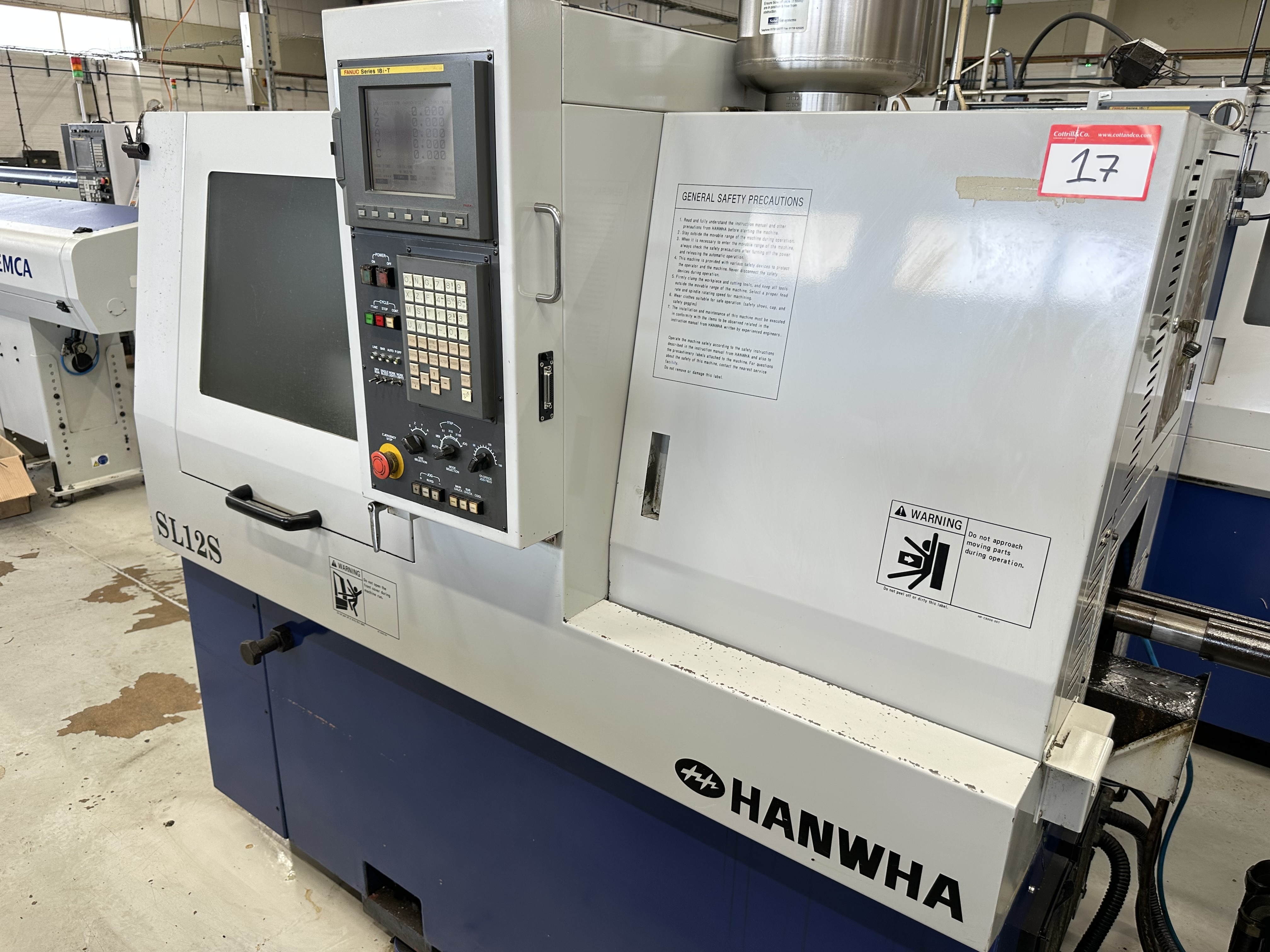 Hanwha SL12S Sliding Head Lathe 5 Axis Machine with Fanuc Series 18i-T CNC Control (2003)