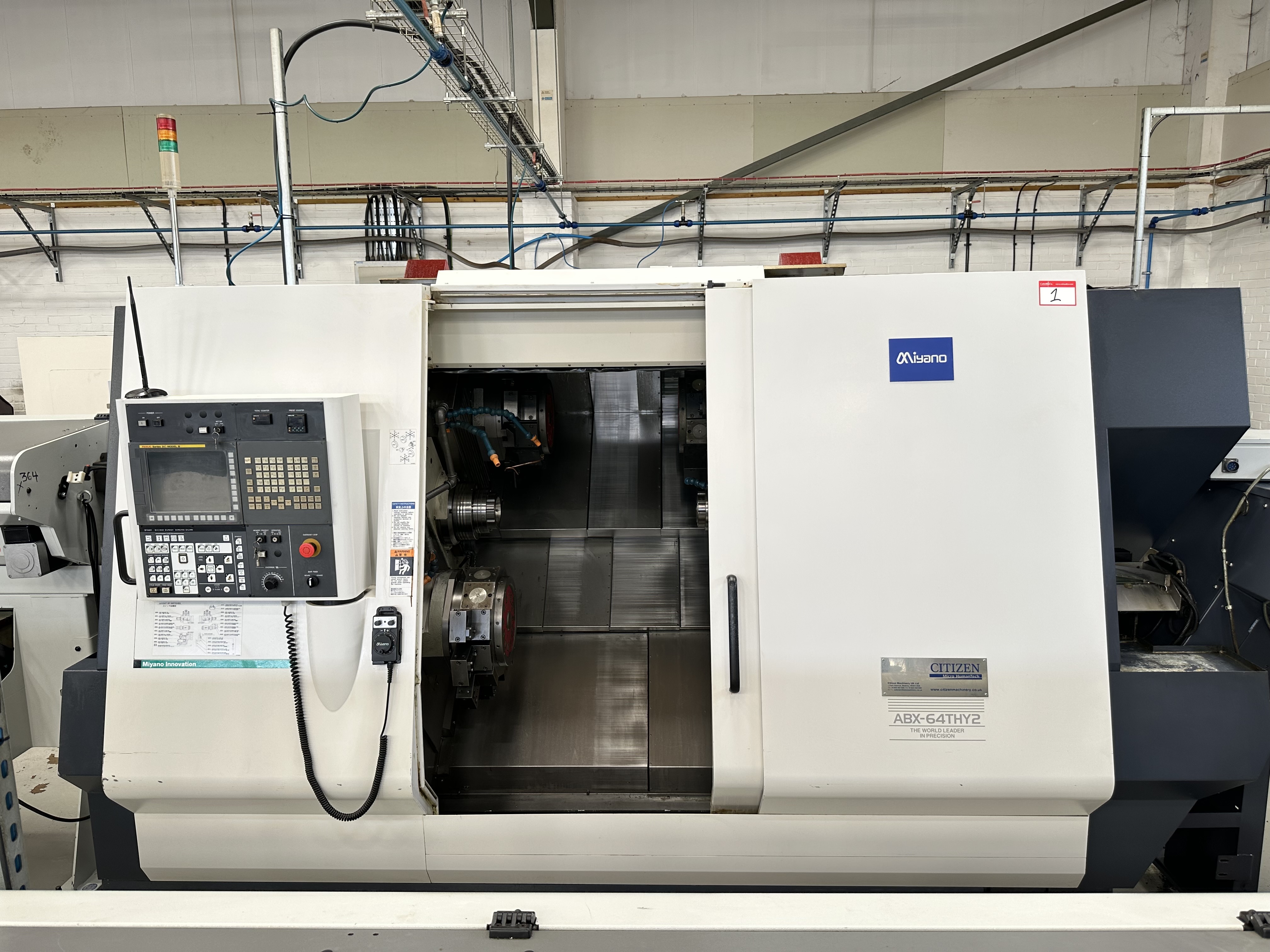 Miyano ABX-64THY2 Twin Spindle Fixed Head Stock Lathe with Fanuc Series 31i Model B CNC Control (2014)