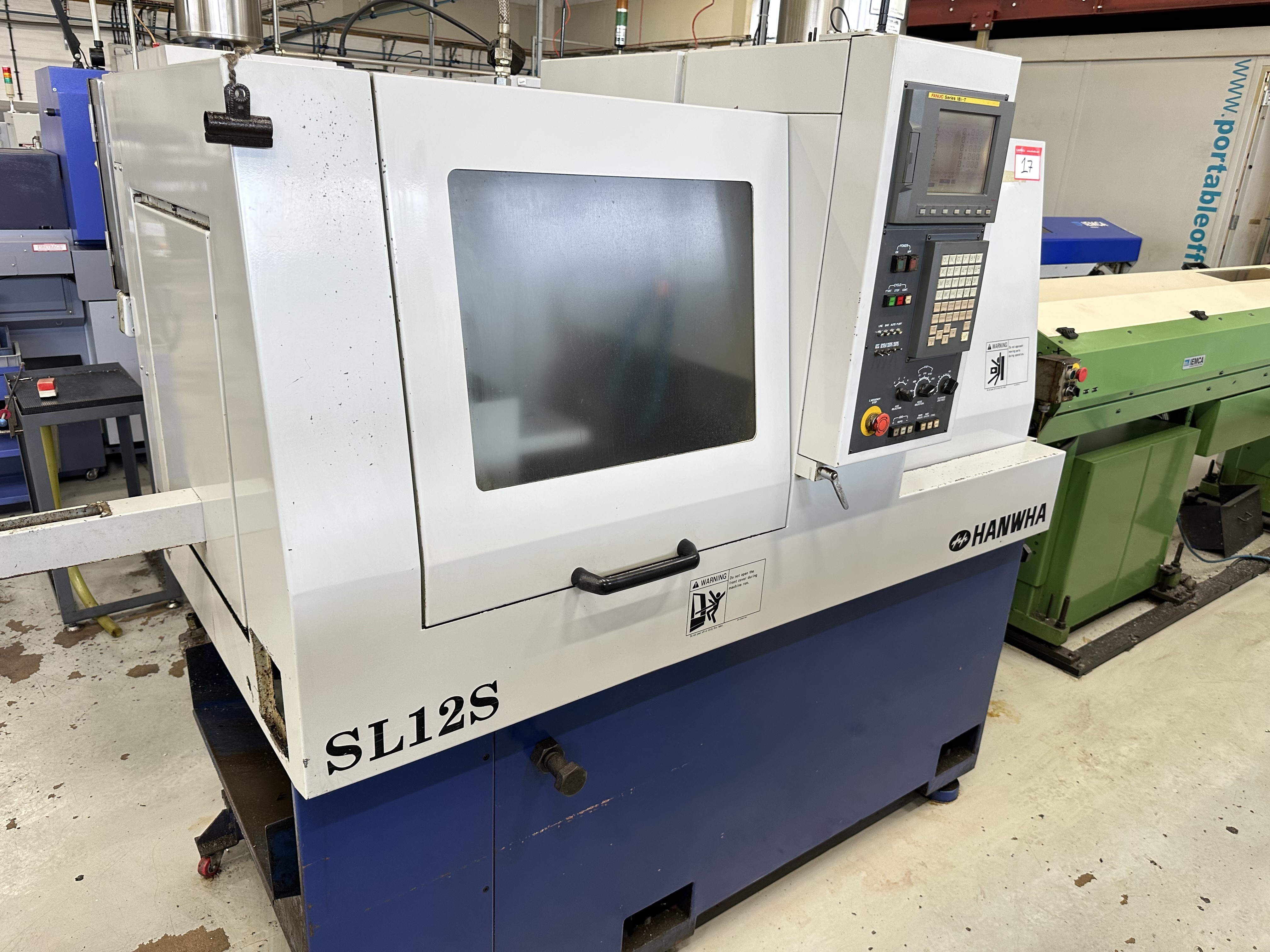 Hanwha SL12S Sliding Head Lathe 5 Axis Machine with Fanuc Series 18i-T CNC Control (2003)