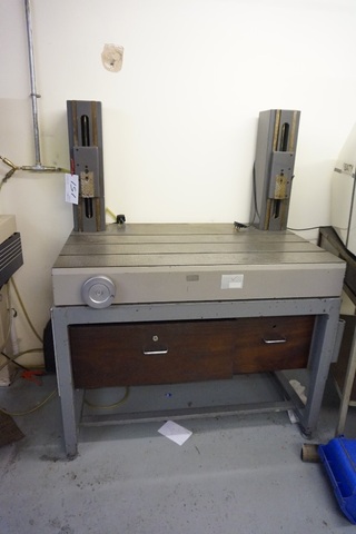 Hand Measuring Machine on Steel Table